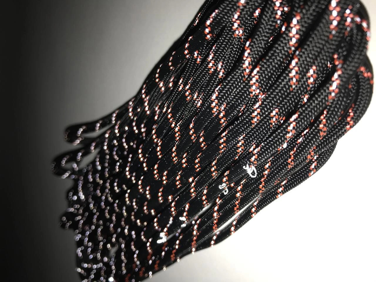 "YakAttack" 550 Paracord – reflektierend (Black/Orange)